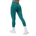 Leggings deportivos de yoga de cintura alta sin costuras y secado rápido para mujer